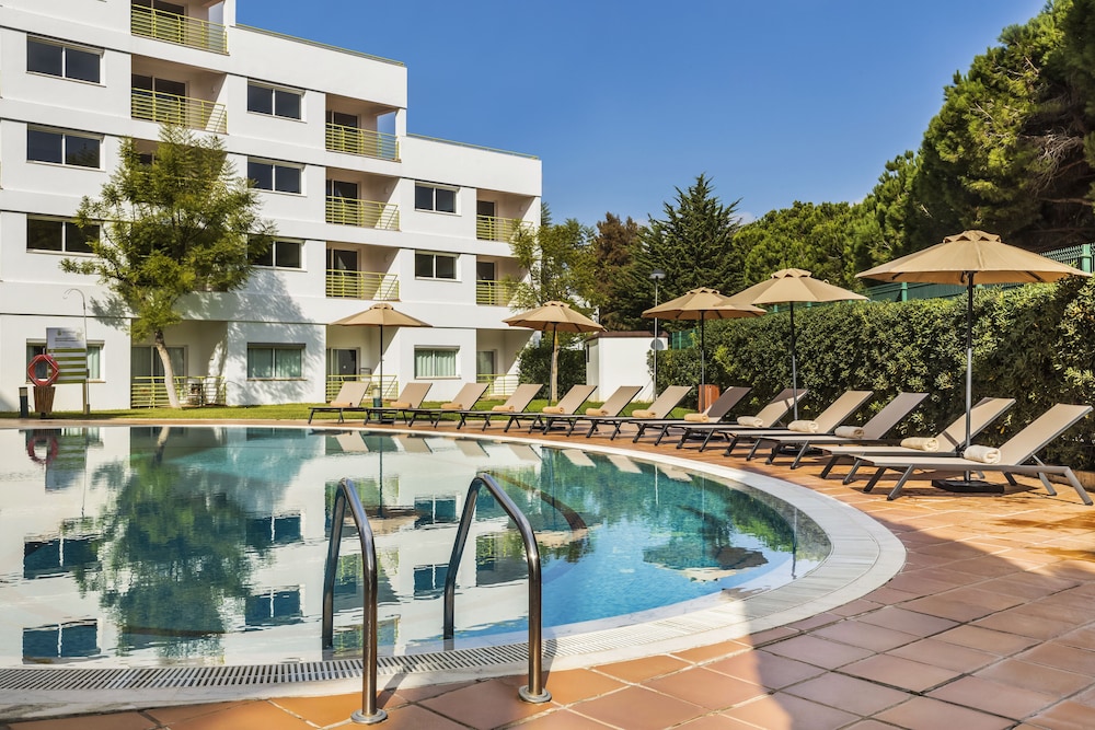 7 nights at The Patio Suite Hotel with 3 green fees